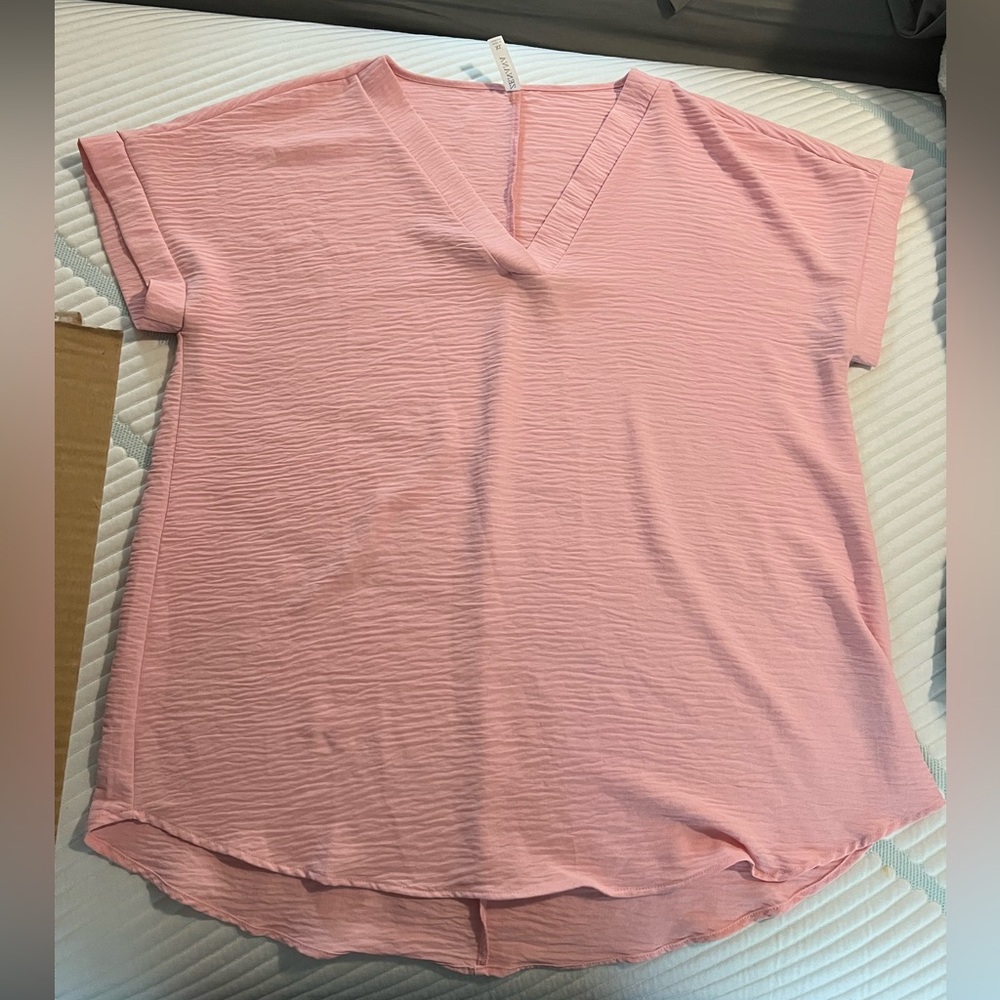 Zenana XL. Only worn 2-3 times. Fits big.
Super comfy and cute.